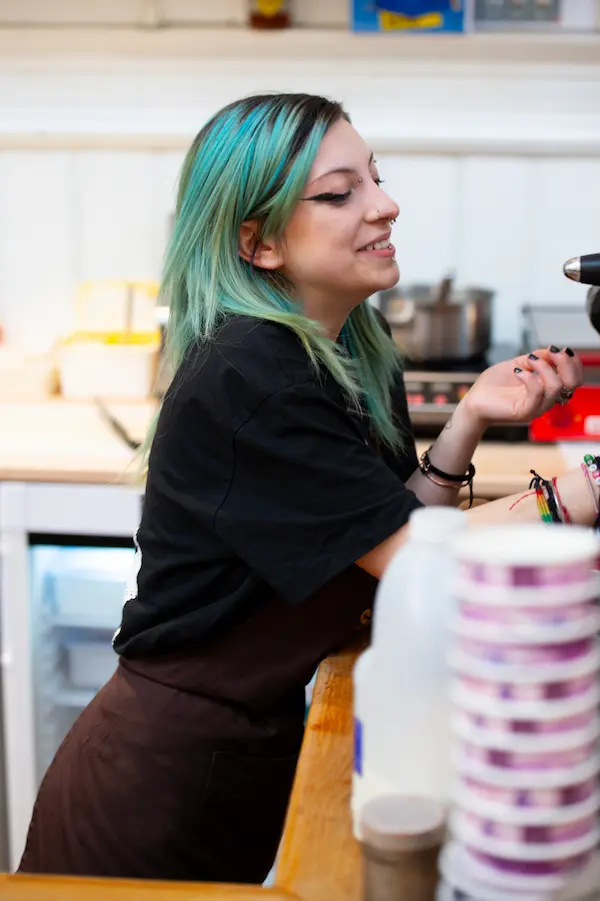 Barista team serving fresh specialty coffee and breakfast in Inverness
