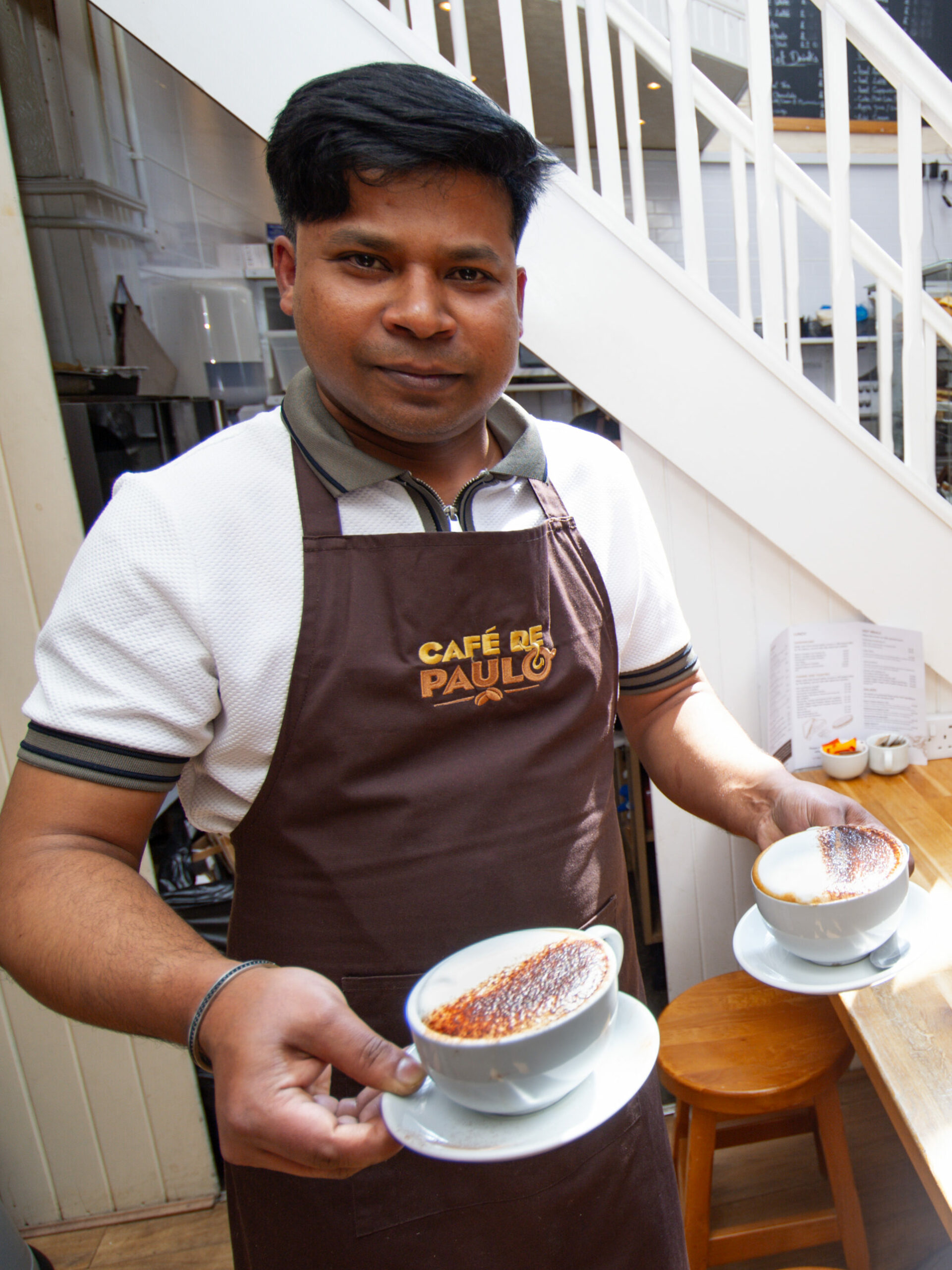 Barista team serving fresh specialty coffee and breakfast in Inverness